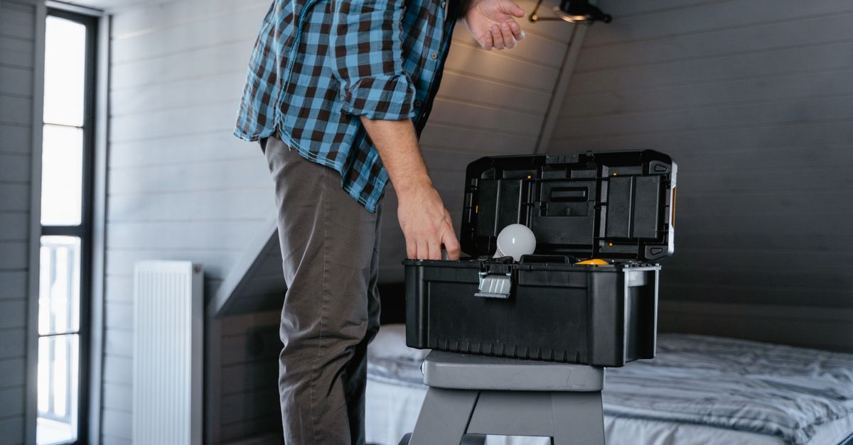 technician toolbox house entrance — Augustine Locksmith Pro